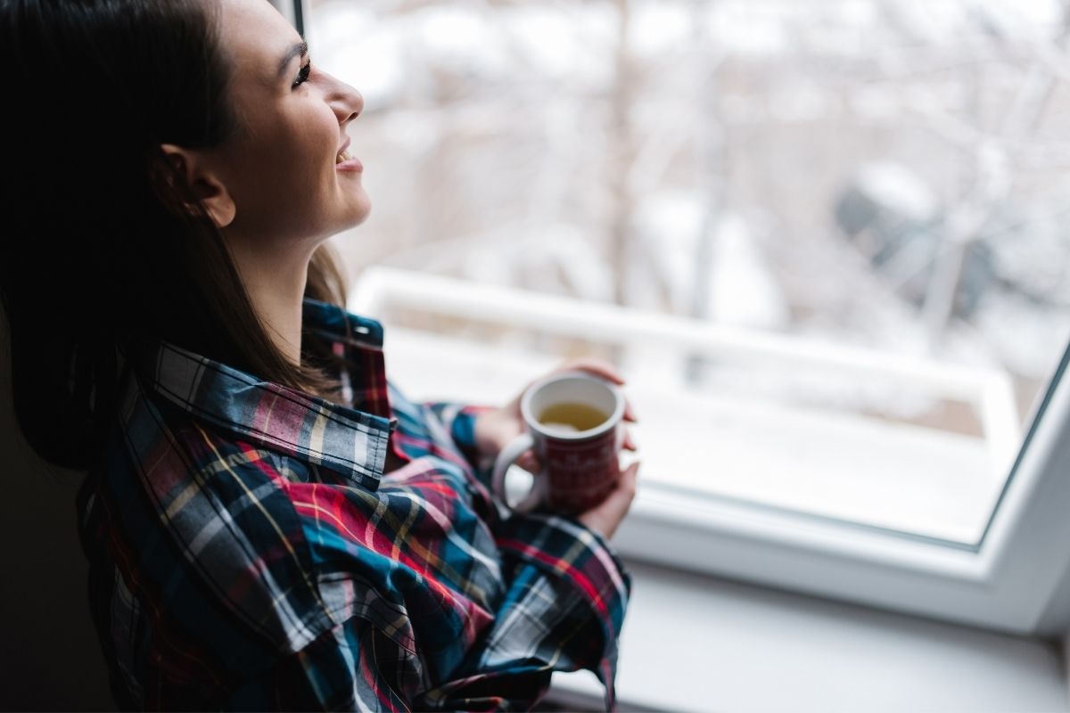 watching snow fall from indoors | The Penrose luxury apartments